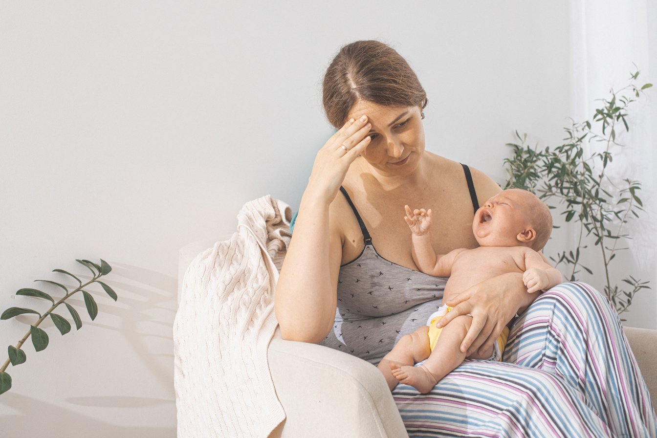 The Young Mom Wants to Breastfeed Her Newborn Baby